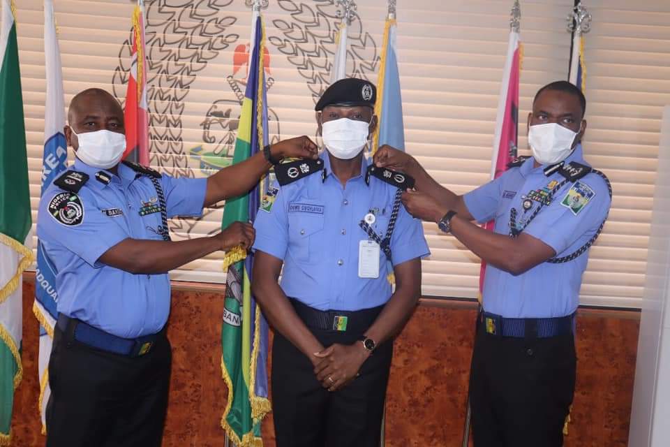 IGP ADAMU DECORATES HIS PSO IDOWU WITH CP RANK.