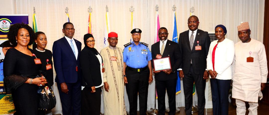 IGP USMAN BABA IN A GROUP PHOTOGRAPH WITH ALTERNATIVE INSTITUTE TEAM.